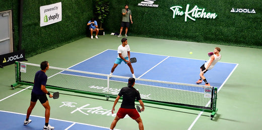 A dramatic moment during a pickleball point on The Kitchen's home court, built by CourTex