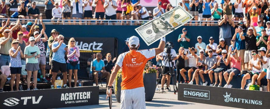 Photoshopped image of a pro pickleball player holding up a $100 bill